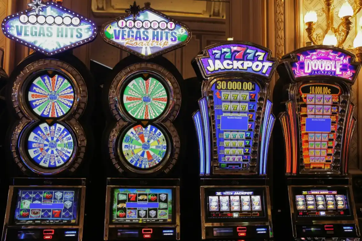 Close-up of slot machine jackpot displays showing large prize amounts