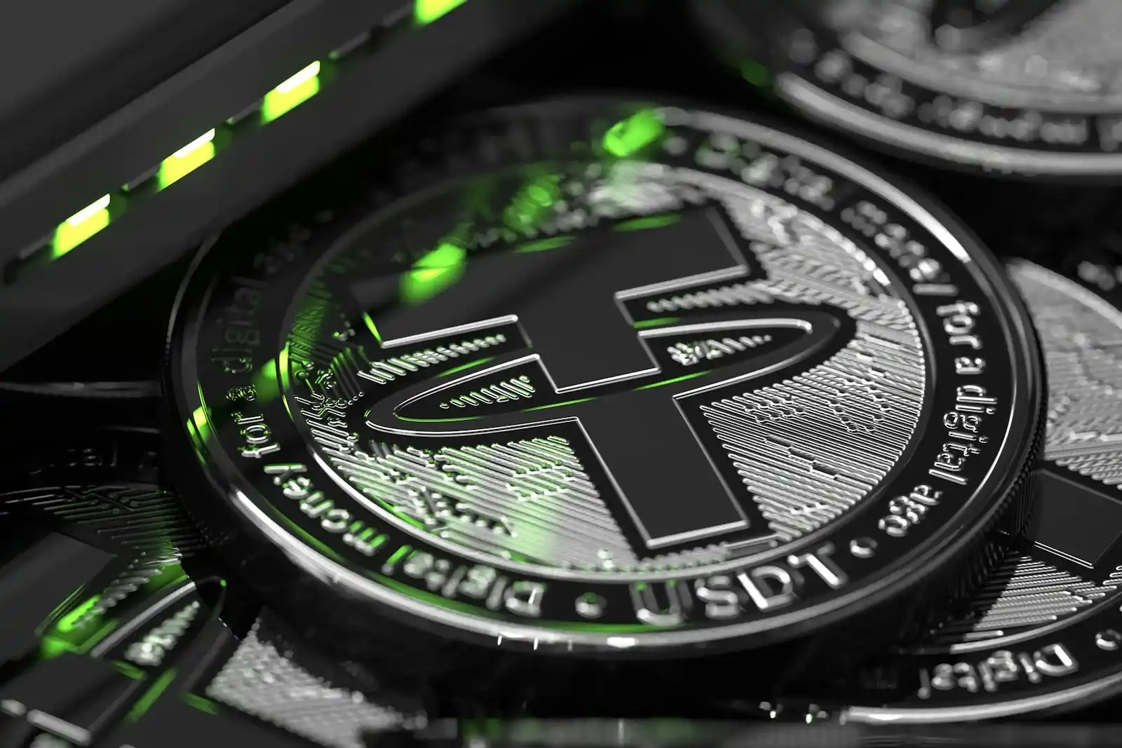Close-up of a Tether USDT coin with green lighting