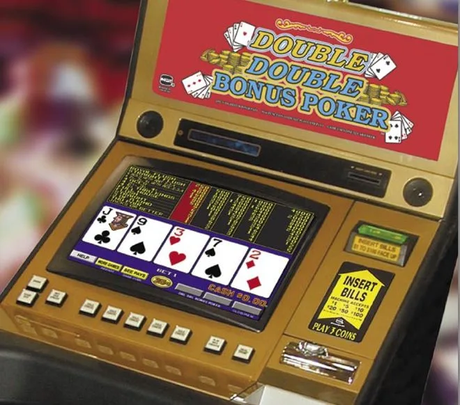 Video poker cabinet showing a Double Double Bonus Poker pay table and a dealt five-card hand